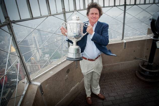 Aug. 13, 2013 - Manhattan, New York, U.S. - JASON DUFNER, 2013 PGA Golf Herren Championship winner, posing with the Wanamaker Trophy, visits the Empire State Building s 86th floor observatory to celebrate his win, Tuesday, August 13, 2013. 2013 PGA Golf Herren Championship Winner Jason Dufner Visits The Empire State Building - ZUMAb09