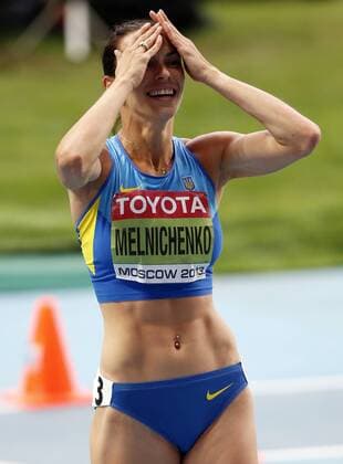 MOSCOW, Aug. 13, 2013 -- Ganna Melnichenko of Ukraine celebrates after the 800M competition of Women s Heptathlon in Day 4 of the 14th IAAF World Athletics Championships Moscow 2013 at Luzhniki Stadium in Moscow, Russia on Aug. 13, 2013. Ganna Melnichenko claimed the title with 6586 points. (Xinhua Wang Lili) (SP)RUSSIA-MOSCOW-ATHLETICS-IAAF WORLD CHAMPIONSHIPS 