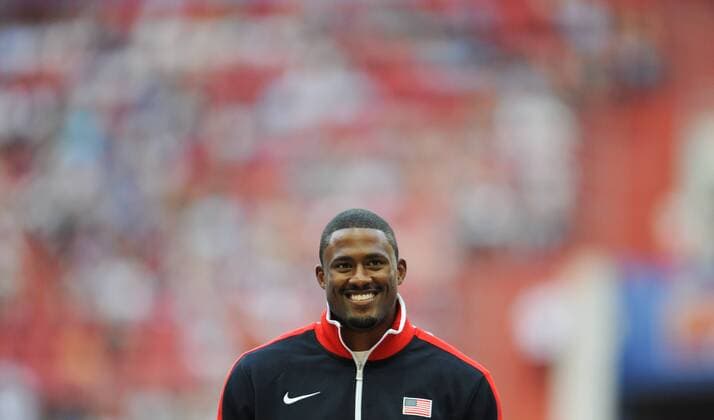 MOSCOW, Aug. 13, 2013 (Xinhua) -- US s David Oliver poses on the podium during the medal ceremony for the men s 110 metres hurdles at the 2013 IAAF World Championships at the Luzhniki stadium in Moscow on August 13, 2013. David Oliver claimed his first World Championship title Monday with 13.00 seconds. (Xinhua Jia Yuchen) (SP)RUSSIA-MOSCOW-ATHLETICS-IAAF WORLD CHAMPIONSHIPS 