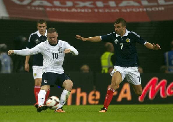 14.08.2013 London, England. England s Wayne Rooney fires in a shot during the International match between England and Scotland, From Wembley Stadium, London. xMarkxDavisonx  ActionPlus11439139
