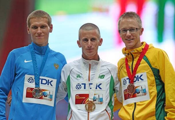 ITAR-TASS: MOSCOW, RUSSIA. AUGUST 15, 2013. Silver medal winner, Russia s Mikhail Ryzhov, gold medal winner, Ireland s Robert Heffernan, and bronze medal winner, Australia s Jared Tallent (L-R) during the medal ceremony for the men s 50km walk at Luzhniki on Day 6 of the 14th IAAF World Championships in Athletics.  premiumd RE12573B
