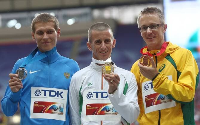 ITAR-TASS: MOSCOW, RUSSIA. AUGUST 15, 2013. Silver medal winner, Russia s Mikhail Ryzhov, gold medal winner, Ireland s Robert Heffernan, and bronze medal winner, Australia s Jared Tallent (L-R) during the medal ceremony for the men s 50km walk at Luzhniki on Day 6 of the 14th IAAF World Championships in Athletics.  premiumd RE12573E