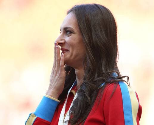 ITAR-TASS: MOSCOW, RUSSIA. AUGUST 15, 2013. Gold medal winner, Russia s Yelena Isinbayeva during the medal ceremony for the women s pole vault final at Luzhniki on Day 6 of the 14th IAAF World Championships in Athletics.  premiumd RE12571Fa