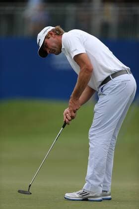 August 16,2013: Lucas Glover putts out at Sedgefield Country Club in Greensboro, NC. GOLF: AUG 16 PGA Golf Herren - Wyndham Championship - Round 2 Icon2013081600095 EDITORIAL USE ONLY