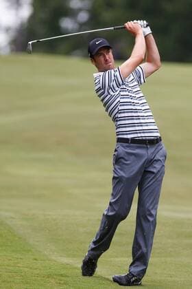 16 August 2013: Ross Fisher hits his second shot onto the 18th green during the second round of the Wyndham Championship at Sedgefield Country Club in Greensboro, NC. GOLF: AUG 16 PGA Golf Herren - Wyndham Championship - Round 2 Icon130816057 EDITORIAL USE ONLY