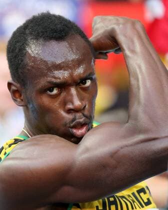 Usain Bolt of Jamaica celebrates after the Men s 200m Final of the 14th IAAF World Athletics Championships Moscow 2013 at Luzhniki Stadium in Moscow, Russia on Aug. 17, 2013. Usain Bolt claimed the title with 19.66 seconds. (Xinhua Li Ming) (SP)RUSSIA-MOSCOW-ATHLETICS-IAAF WORLD CHAMPIONSHIPS 