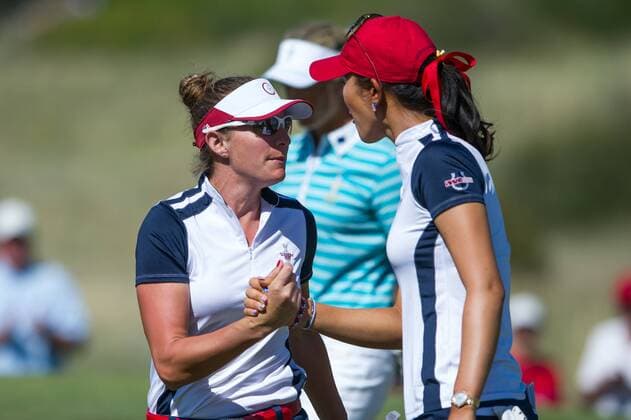 17 AUGUST 2013: Brittany Lang and Michelle Wie celebrate during the foursome matches on day 2 of The Solheim Cup at the Colorado Golf Club in Parker, Colorado. GOLF: AUG 17 LPGA Golf Damen - The Solheim Cup - Second Round Icon1321308161302 EDITORIAL USE ONLY