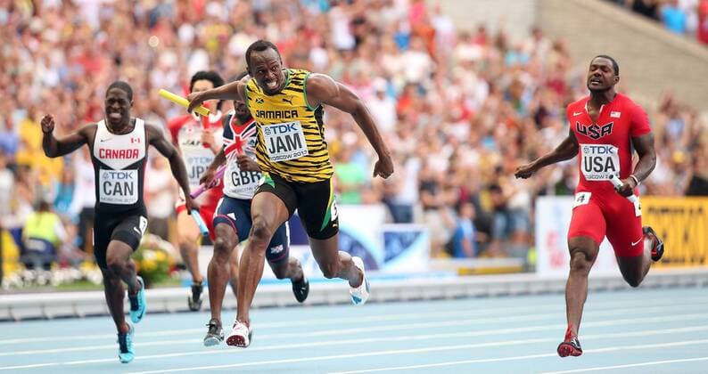 (130818) -- MOSCOW, Aug. 18, 2013 (Xinhua) --Usain Bolt of Jamaica(2nd,R) crosses the finish line druing the men s 4X100 Meters Relay final at the 14th IAAF World Athletics Championships 2013 in Moscow, Russia on Aug. 18, 2013. Team of Jamica won the gold with 37.36 seconds. (Xinhua Li Ming) (SP)RUSSIA-MOSCOW-ATHLETICS-IAAF WORLD CHAMPIONSHIPS 
