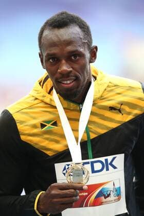 ITAR-TASS: MOSCOW, RUSSIA. AUGUST 18, 2013. Jamaica s gold medalist Usain Bolt poses at the awarding ceremony for the men s 200m event at the 2013 IAAF World Championships in Athletics, at Luzhniki Stadium.  RE125C40