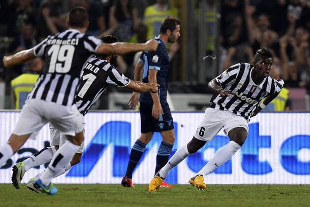 Esultanza di Paul Pogba Juventus dopo il gol 1-0. Delusione Senad Lulic Lazio Goal celebration Roma 18 8 2013 Stadio Olimpico Football Calcio Supercoppa Italiana Juventus Vs Lazio Foto Andrea Staccioli Insidefoto andreaxstaccioli