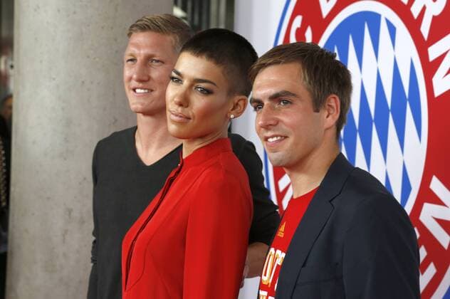 Bastian Schweinsteiger, Alina Süggeler und Philipp Lahm bei der Weltpremiere des Dokumentarfilms Wembley - Football is coming hoam im Mathäser Filmpalast. München, 19.08.2013 Foto:xD.xBedrosianx xFuturexImage