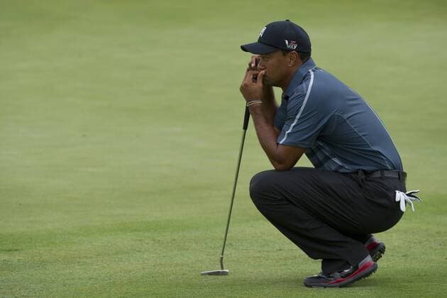 Aug. 23, 2013 - Jersey City, New Jersey, U.S - August 23, 2013: Tiger Woods (USA) studies the green before he decides to putt during the the second round of The Barclays Fed Ex at Liberty National Golf Course in Jersey City, NJ. Kostas Lymperopoulos csm GOLF 2013: The Barclays Fed Ex Championship Second Round AUG 23 - ZUMAc04