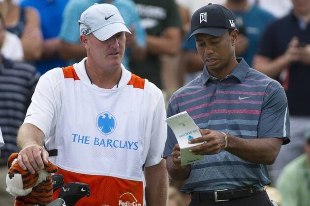 Aug. 23, 2013 - Jersey City, New Jersey, U.S - August 23, 2013: Tiger Woods (USA) has words with his caddy as they analyze the next hole during the the second round of The Barclays Fed Ex at Liberty National Golf Course in Jersey City, NJ. Kostas Lymperopoulos csm GOLF 2013: The Barclays Fed Ex Championship Second Round AUG 23 - ZUMAc04