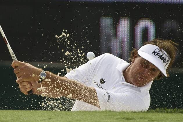 Aug. 23, 2013 - Jersey City, New Jersey, U.S - August 23, 2013: Phil Mickelson (USA) hits the ball out of a sandtrap on the 18th hole during the continuation of the first round of The Barclays Fed Ex Championship at Liberty National Golf Course in Jersey City, NJ. Kostas Lymperopoulos csm GOLF 2013: The Barclays Fed Ex Championship AUG 23 - ZUMAc04
