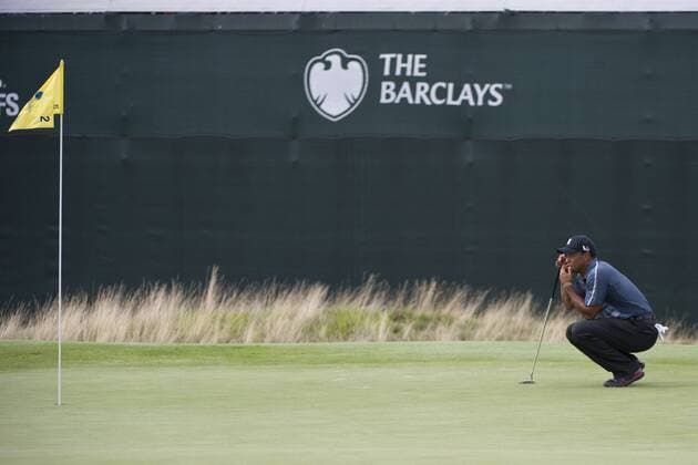 Aug. 23, 2013 - Jersey City, New Jersey, U.S - August 23, 2013: Tiger Woods (USA) crouches down as he studies his next putt during the the second round of The Barclays Fed Ex at Liberty National Golf Course in Jersey City, NJ. Kostas Lymperopoulos csm GOLF 2013: The Barclays Fed Ex Championship Second Round AUG 23 - ZUMAc04