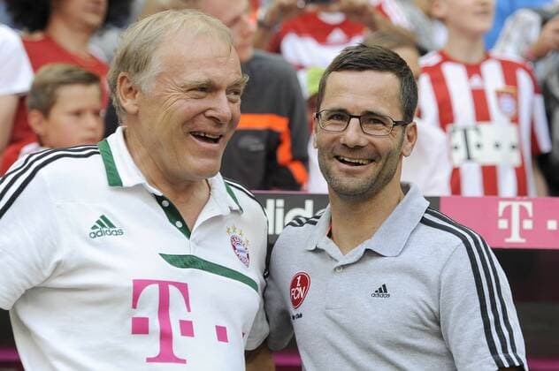 Michael WIESINGER (Trainer Nürnberg,re) mit Hermann GERLAND,Co Trainer Bayern München. Fussball 1. Bundesliga, 3. Spieltag, FC Bayern München (M)-1.FC Nürnberg (N) 2-0. ,am 24.08.2013 ,ALLIANZ ARENA München Deutschland.