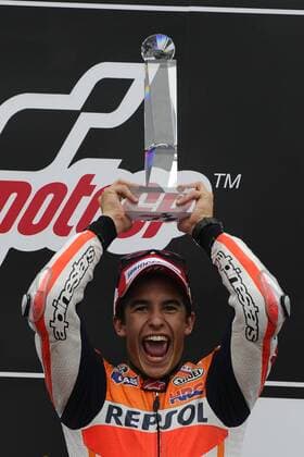 Winner of MotoGP class Marc Marquez of Spain celebrates his victory at the Motorcycle Grand Prix of the Czech Republic at the Masaryk circuit in Brno, Czech Republic, Sunday, Aug. 25, 2013. (CTKxPhoto VaclavxSalek) CTKPhotoP201308250263501  sal 25