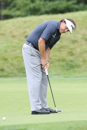 Aug. 30, 2013 - Norton, Massachusetts, USA - August 30, 2013 - Norton, Massachusetts, U.S. - Phil Mickelson putts on the 8th green during the first round of the Deutsche Bank Championship, FedEx Cup playoffs held at the Tournament Players Club in Norton Massachusetts. Mickelson finished the day 8 under with a 63. Eric Canha CSM PGA Golf Herren 2013: Deutsche Bank Championship Round 1 AUG 30 - ZUMAc04