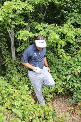 Aug. 30, 2013 - Norton, Massachusetts, USA - August 30, 2013 - Norton, Massachusetts, U.S. - Phil Mickelson searches the woods along the 9th fairway for his errant ball during the first round of the Deutsche Bank Championship, FedEx Cup playoffs held at the Tournament Players Club in Norton Massachusetts. Mickelson finished the day 8 under with a 63. Eric Canha CSM PGA Golf Herren 2013: Deutsche Bank Championship Round 1 AUG 30 - ZUMAc04
