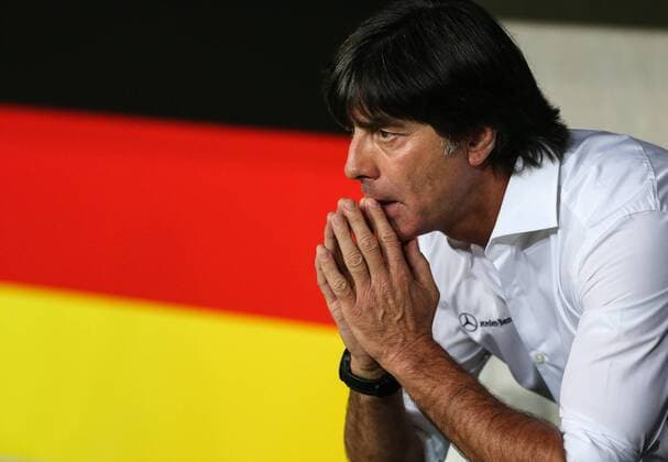 Joachim Loew, head coach of Germany, reacts ahead of the FIFA 2014 World Cup Qualifying match between Germany and Austria in Munich, Germany, on Sept. 6, 2013. Germany won 3-0. (Xinhua Zhang Fan) (SP)GERMANY-MUNICH-SOCCER-FIFA 2014 WORLD CUP QUALIFIER-GERMANY VS AUSTRIA 