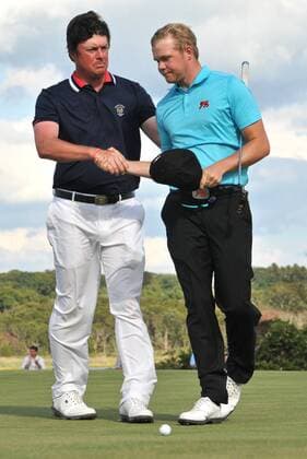 08 September 2013:Nathan Smith shakes hands with Nathan Kimsey as Smith wins the match and gets the United States enough points to keep the Walker Cup during the 44th Walker Cup at National Golf Links of America Southampton, NY GOLF: SEP 08 USGA - Walker Cup Icon14713090802244 EDITORIAL USE ONLY
