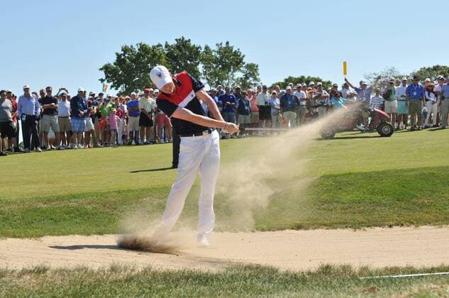 08 September 2013: Jordan Niebrugge hits a short shot out of the sand on the 18th fairway during the 44th Walker Cup at National Golf Links of America Southampton, NY GOLF: SEP 08 USGA - Walker Cup Icon20133412 EDITORIAL USE ONLY