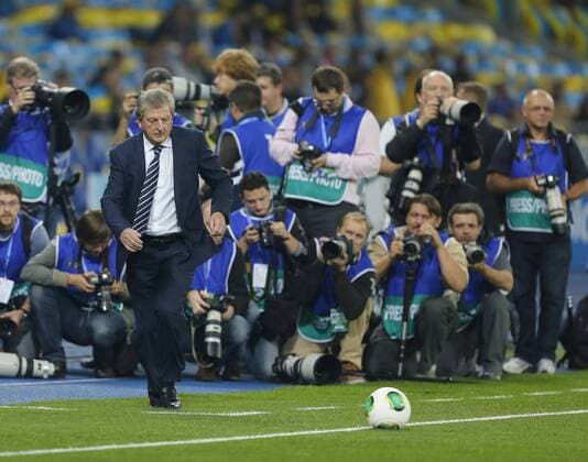 England s Roy Hodgson looks on surounded by photographers Ukraine v England - 2014 World Cup Qualifier - Olympic Stadium - Kiev - Ukraine -10 09 2013 - Pic David Klein Sportimage EDITORIAL USE ONLY. No use with unauthorised audio, video, data, fixture lists, club league logos or live services. Online in-match use limited to 120 images, no video emulation. No use in betting, games or single club league player publications.