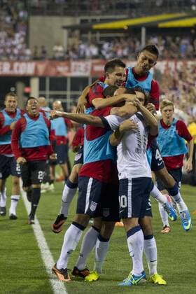 Sept. 10, 2013 - Columbus, Ohio, U.S - September 10, 2013: US Men s National Team forward Landon Donovan (10) is mobbed by his team after scoring the second goal of the game during the U.S. Men s National Team vs. Mexico National Team- World Cup Qualifier match at Columbus Crew Stadium - Columbus, OH. The United States Men s National Team defeated The Mexico National Team 2-0 and clinched a spot for the World Cup in Brazil. SOCCER 2013: US Men s National Team vs Mexico National Team SEP 10 - ZUMAc04