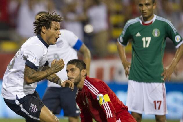 Sept. 10, 2013 - Columbus, Ohio, U.S - September 10, 2013: Mexico National Team goalkeeper Jose de Jesus Corona (1) is disappointed and Mexico National Team midfielder Jesus Zavala (17) looks on as US Men s National Team midfielder Jermaine Jones (13) celebrates after the first goal was scored during the U.S. Men s National Team vs. Mexico National Team- World Cup Qualifier match at Columbus Crew Stadium - Columbus, OH. The United States Men s National Team defeated The Mexico National Team 2-0 and clinched a spot for the World Cup in Brazil. SOCCER 2013: US Men s National Team vs Mexico National Team SEP 10 - ZUMAc04