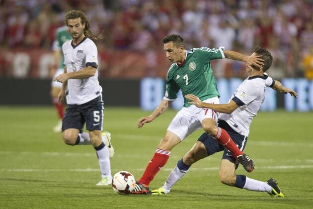 Sept. 10, 2013 - Columbus, Ohio, U.S - September 10, 2013: US Men s National Team midfielder Alejandro Bedoya (11) slide tackles and takes a hand to the face from Mexico National Team midfielder Christian Gimenez (7) during the U.S. Men s National Team vs. Mexico National Team- World Cup Qualifier match at Columbus Crew Stadium - Columbus, OH. SOCCER 2013: US Men s National Team vs Mexico National Team SEP 10 - ZUMAc04