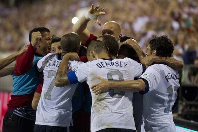 Sept. 10, 2013 - Columbus, Ohio, U.S - September 10, 2013: US Men s National Team forward Landon Donovan (10) is mobbed by US Men s National Team forward Clint Dempsey (8), US Men s National Team defender DaMarcus Beasley (7) and the rest of the team after scoring the second goal of the match during the U.S. Men s National Team vs. Mexico National Team- World Cup Qualifier match at Columbus Crew Stadium - Columbus, OH. The United States Men s National Team defeated The Mexico National Team 2-0 and clinched a spot for the World Cup in Brazil. SOCCER 2013: US Men s National Team vs Mexico National Team SEP 10 - ZUMAc04