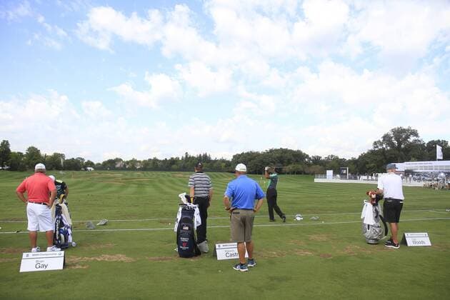 12 September 2013:Brian Gay, Roberto Castro and Tiger Woods on the practice tee prior to First round action of the BMW Championship at Conway Farms Golf Club in Lake Forest, Illinois. GOLF: SEP12 PGA Golf Herren - BMW Championship - First Round Icon20417109 EDITORIAL USE ONLY