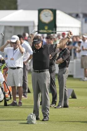 12 September 2013:Phil Mickelson stretches on the practice tee prior to First Round action of the BMW Championship at Conway Farms Golf Club in Lake Forest, Illinois. GOLF: SEP 12 PGA Golf Herren - BMW Championship - Round 01 Icon20417057 EDITORIAL USE ONLY