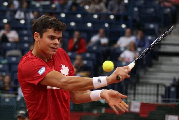 Milos Raonic of Canada returns a ball during their Davis Cup semifinal tennis match in Belgrade, Serbia, Sept. 13, 2013. (Xinhua BorislavxZdrinja) (SP)SERBIA-BELGRADE-TENNIS-DAVIS CUP 