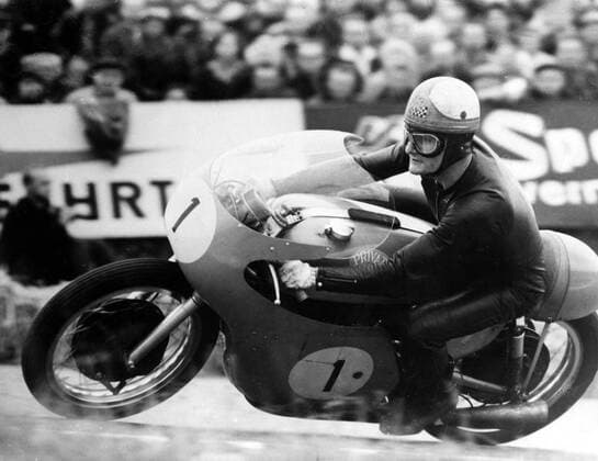 Mike Hailwood : 2 April 1940 - 23 March 1981 , British Grand Prix motorcycle road racer . Seen here at the motor cycling world championships held on the Sachsenring circuit in Hohenstein , East Germany . 22 August 1963  UnitedArchives00695207