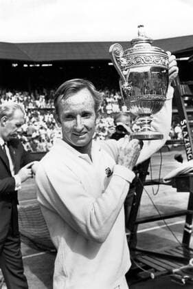 Rod Laver (AUS) No. 1 seed and defending champion, shows off the men s singles championship trophy on the Centre Court. It was the fourth time that Laver had won the title. - Wimbledon 5th July 1969 Â  UnitedArchives00929359