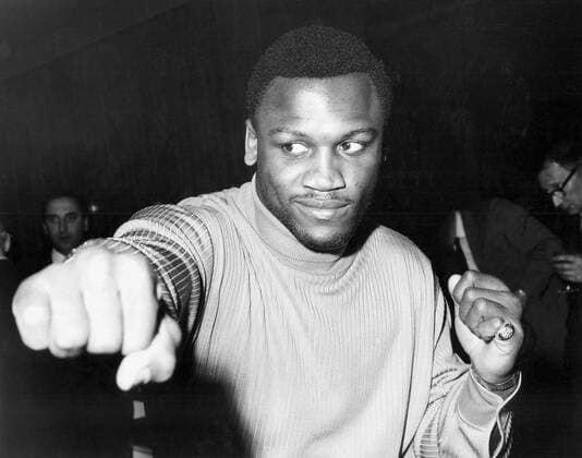 Joe Frazier, heavyweight champion of the World recognised by the World Boxing Council, arrived today. Portrait of Joe Frazier taken at the Hilton Hotel today. 2 April 1968  UnitedArchives01008636