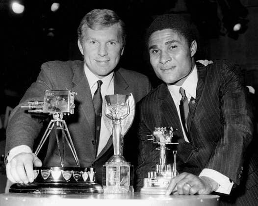 16th December 1966: Sports Personality of the Year. Photo shows: Two top international footballers win the BBC tv sports personality of the year. England captain, Booby Moore (on left) and Portugal s, Eusebio, received awards at the ceremony.  UnitedArchives01009535