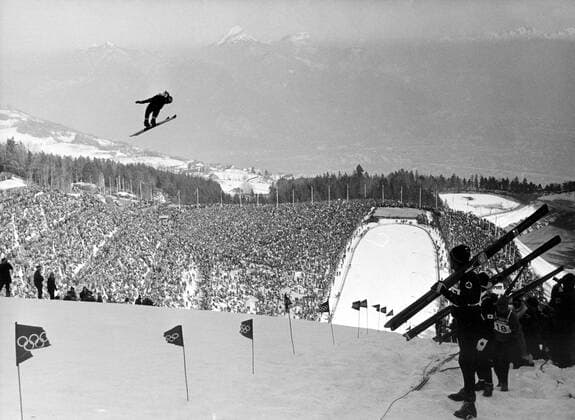 1968 Winter Olympic Games - Grenoble, France A general view of the 90m ski jump event showing the large crowd of spectators around the mountain of Saint-Nizier 18 February 1968 Â  UnitedArchives01026113