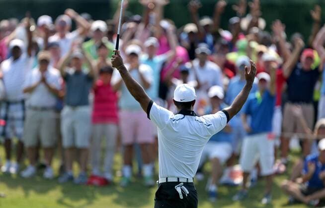 Sept. 20, 2013 - Atlanta, Georgia, USA - Tiger Woods celebrates with the crowd after his birdie on the No. 3 hole during round two of the 2013 Tour Championship at East Lake Golf Club in Atlanta, Georgia, Friday, September 20, 2013. Tour Championship - ZUMAm67