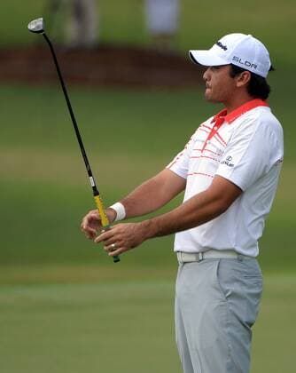 Jason Day leans back after a long putt for birdie stops short on No. 2 and settles for par during the final round of the PGA Golf Herren Tour Championship on September 22, 2013 at East Lake Golf Club in Atlanta. The FedEx Cup playoff winner stands to gain a $10 million payout bonus.  AJP201309205