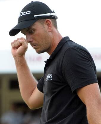 Henrik Stenson clinches his fist after putting out on No. 18 during the final round of the PGA Golf Herren Tour Championship on September 22, 2013 at East Lake Golf Club in Atlanta. Stenson won the FedEx Cup playoff with a 13-under par score, three strokes better than second place finisher Jordan Spieth.  AJP2013092220