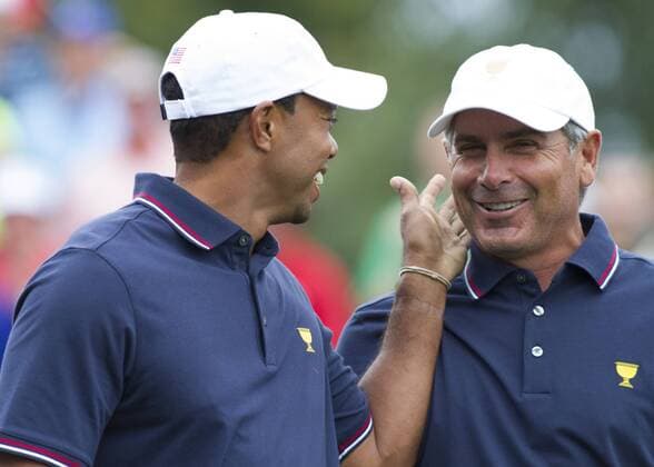 03 October 2013: Tiger Woods of the United States Team and United States Team Captain Fred Couples during the day one of The Presidents Cup at Muirfield Village GC in Dublin, Ohio GOLF: OCT 03 PGA Golf Herren - The Presidents Cup - Day One Icon131003002 EDITORIAL USE ONLY