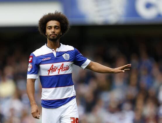 QPR s Benoit Assou-Ekotto in action QPR v Barnsley - Npower Championship - Loftus Road - London - England -05 10 2013 - Pic David Klein Sportimage EDITORIAL USE ONLY. No use with unauthorised audio, video, data, fixture lists, club league logos or live services. Online in-match use limited to 120 images, no video emulation. No use in betting, games or single club league player publications.