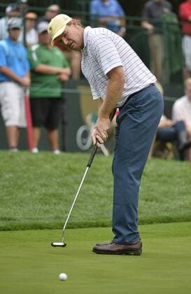 International Team member Ernie Els of South Africa attempts a birdie putt on the sixth hole during the third round four-ball competition against the United States Team at the 2013 Presidents Cup at Muirfield Village Golf Club in Dublin, Ohio on October 5, 2013.  BKX2013100516