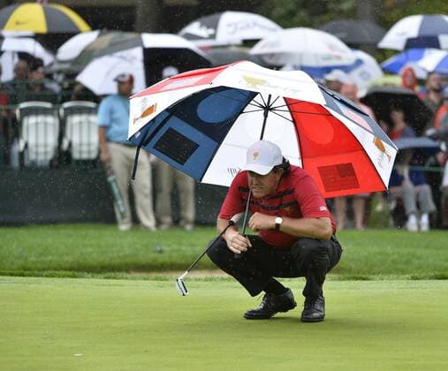 United States Team member Phil Mickelson looks at his putt on the eighth hole during the third round four-ball competition against the International Team at the 2013 Presidents Cup at Muirfield Village Golf Club in Dublin, Ohio on October 5, 2013.  BKX2013100526