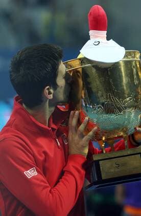 BEIJING, CHINA - OCTOBER 06: (CHINA OUT) Novak Djokovic of Serbia poses with the trophy after his men s final match on day nine of the 2013 China Open at the National Tennis Center on October 6, 2013 in Beijing, China.  CFP444647672 