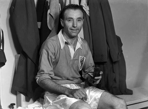 Football - 1953 FA Cup Final - Blackpool 4 Bolton Wanderers 3 Stanley Matthews with his FA Cup winners medal in the changing rooms at Wembley. 02 05 1953 
