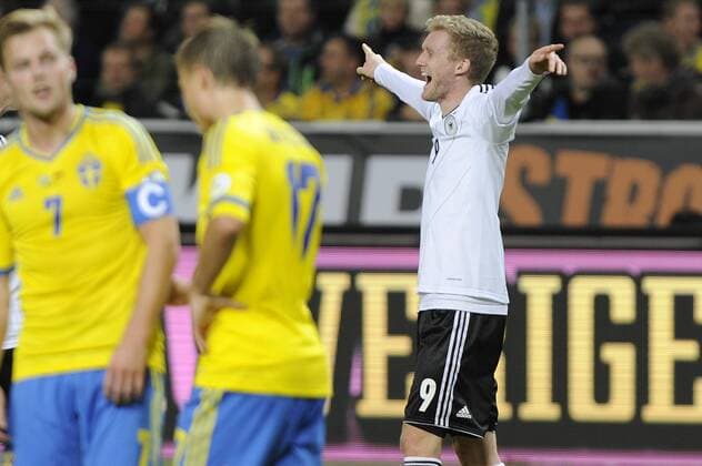 Andre SCHÜRRLE (GER),Jubel,Freude,Begeisterung, nach Tor zum 3-5,Torjubel,Aktion. Fussball Länderspiel, WM-Qualifikation Gruppe C, Schweden (SWE)-Deutschland (GER) 3-5. am 15.10.2013 ,FRIENDS ARENA Stockholm.