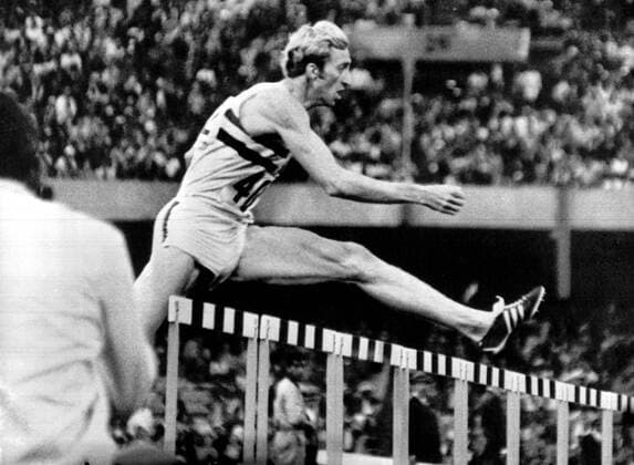 Britains David Hemery (402) out in front as he streaks to a new World Record of 48.1 secs and a gold medal in the mens 400 metres hurdles at the 1968 Olympic Games in mexico City. It was Britains first gold of the 1968 Olympic Games 16th October 1968, Olympia, Olympiade, Olympische Spiele kbdig 2000 quer 16th 48.1 Britains City David Games Hemery It October Olympia Olympiade Olympic Olympic Games Olympics Olympische Record Spiele World and as at first front gold he hurdles in jump leap hurdling leap medal mens metres mexico new of out race running secs streaks the to was 